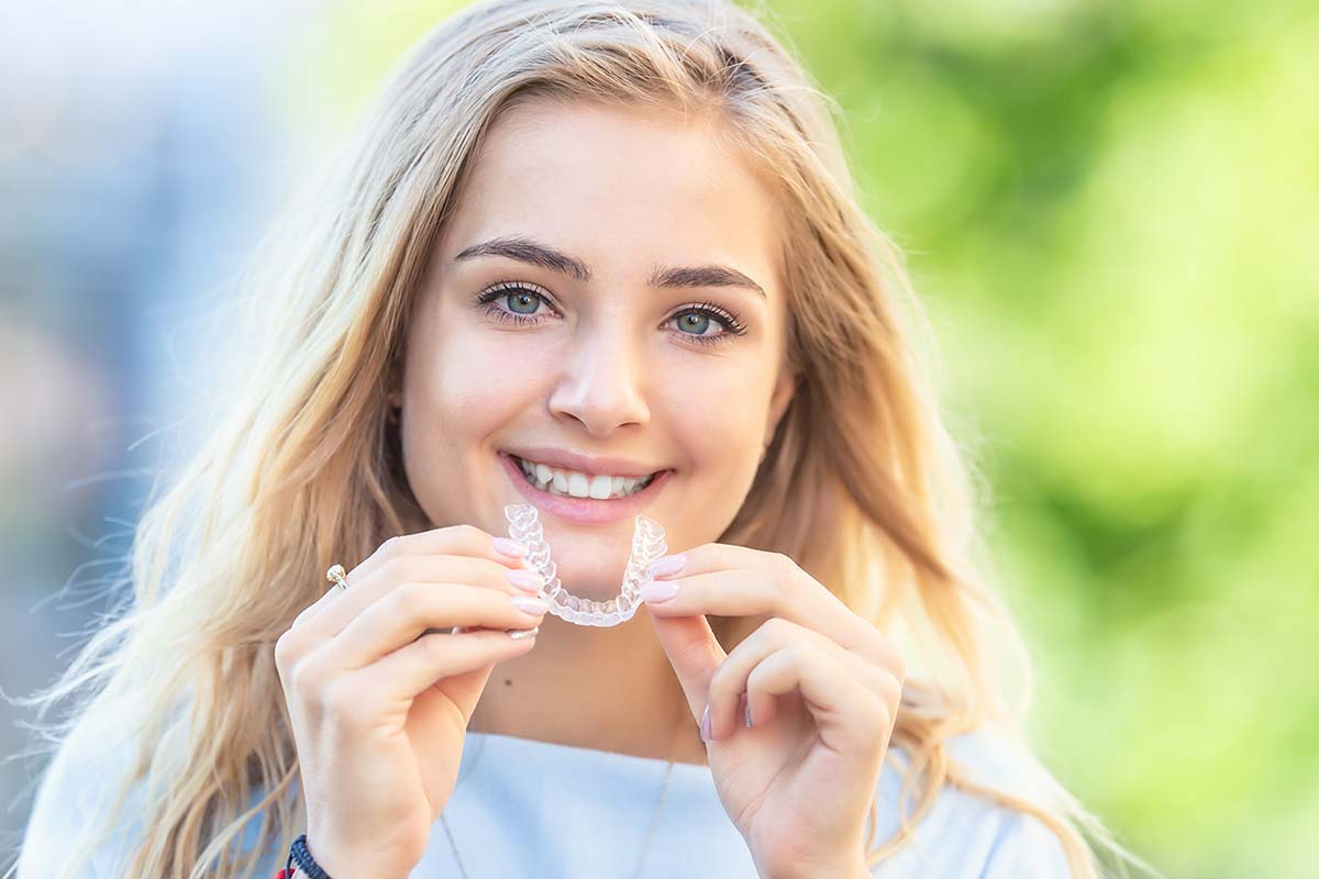 Teenager with invisalign treatment