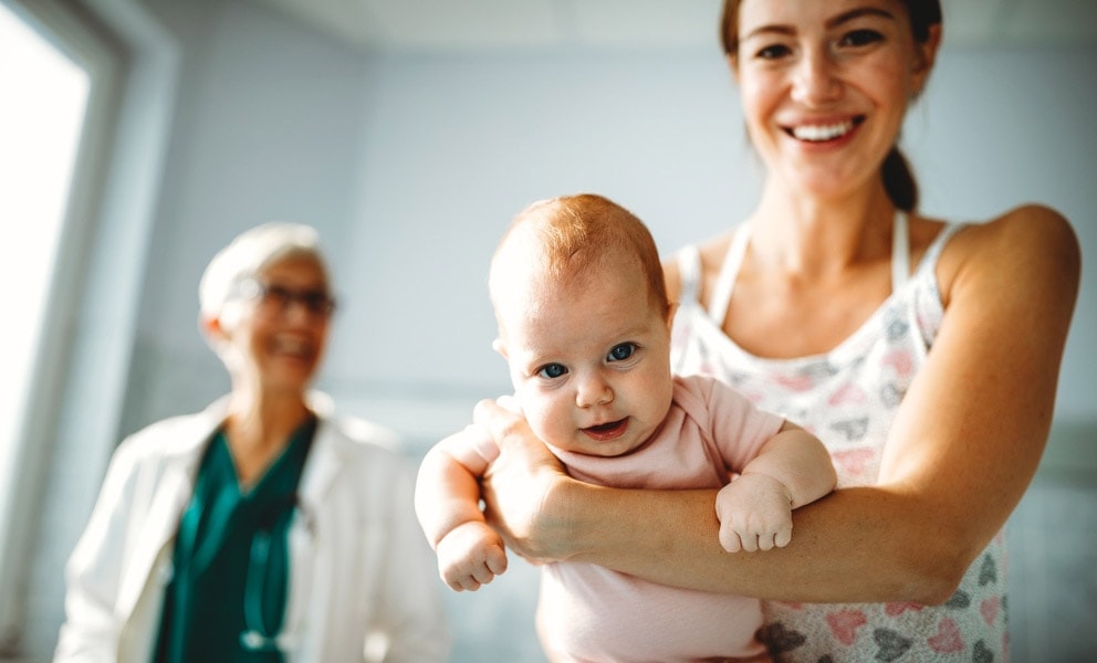 Pediatrician with Mother and Baby Image